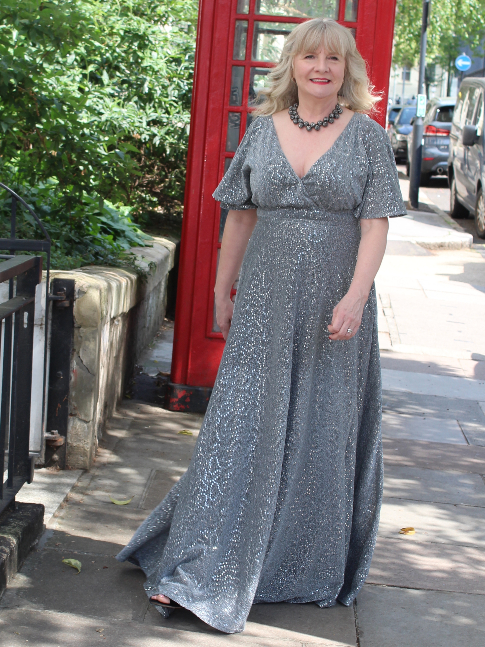 Julie Player wearing Goddiva dress