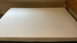 The Simba Hybrid Mattress photographed from the side in our reviewer's bedroom