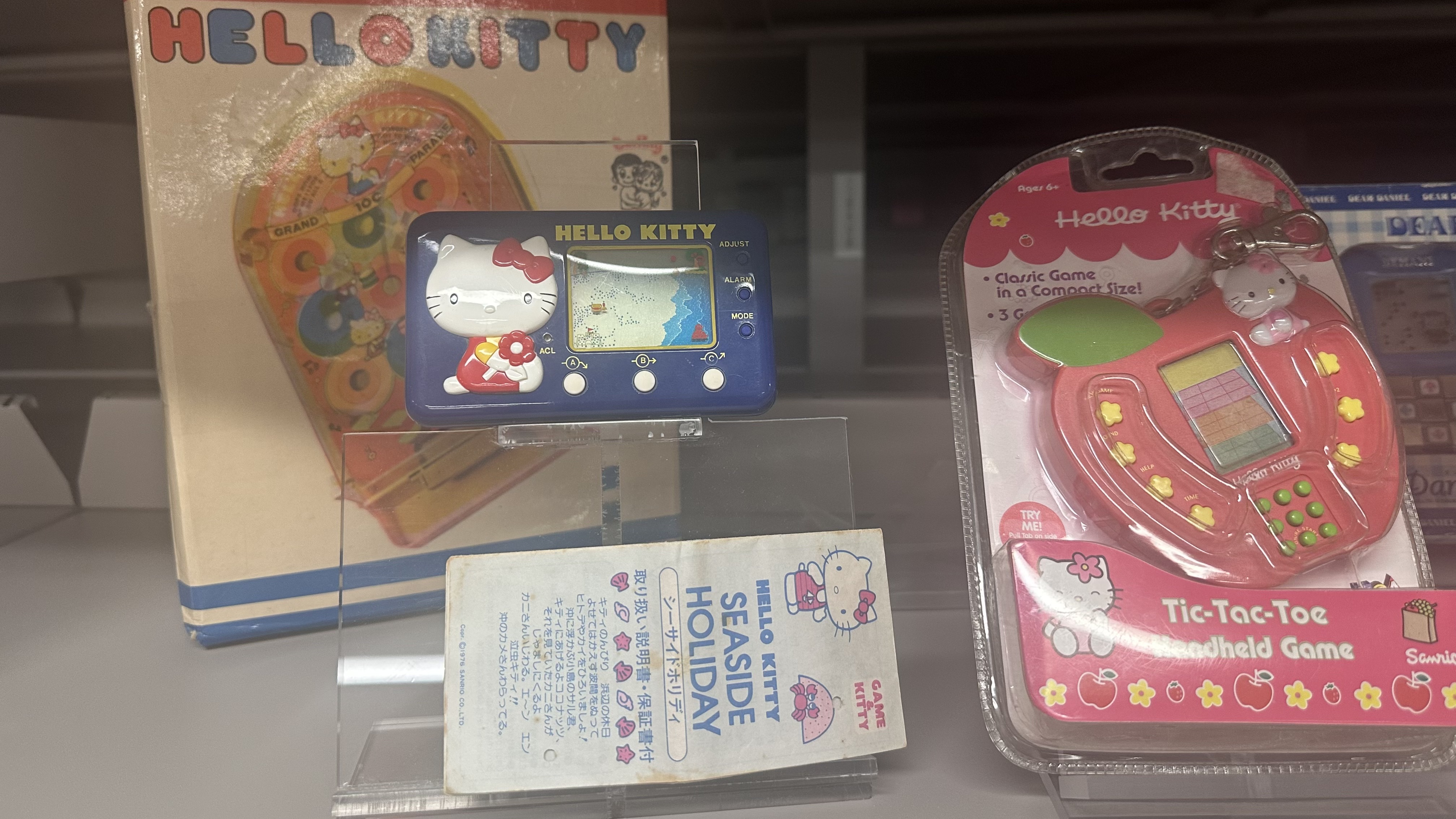A photo shows vintage Hello Kitty handheld games in The Strong museum archives