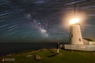 Star Trails and Milky Way Shine over Lighthouse by Mike Taylor 