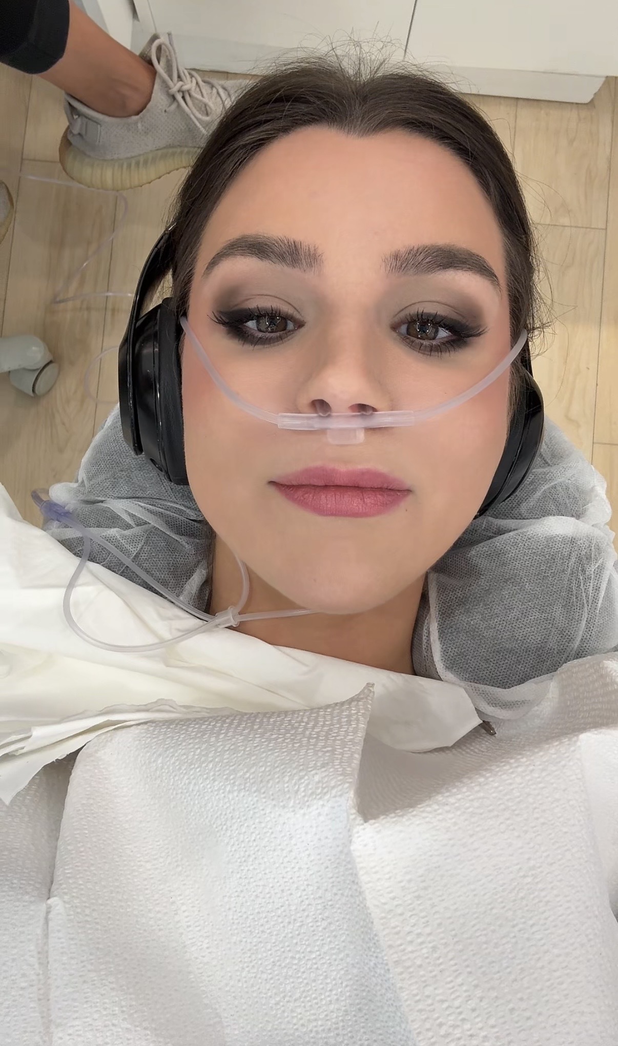 siena gagliano lays down with laughing gas at a dentist appointment