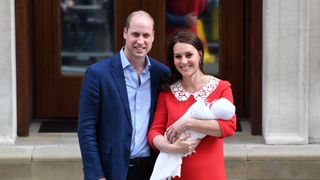 Kate Middleton and Prince William pose with Prince Louis after giving birth on April 23rd 2018