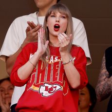 Taylor Swift cheering on her boyfriend Travis Kelce and the Kansas City Chiefs