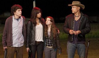 Zombieland Jesse Eisenberg Emma Stone Abigail Breslin and Woody Harrelson stand outside in the night