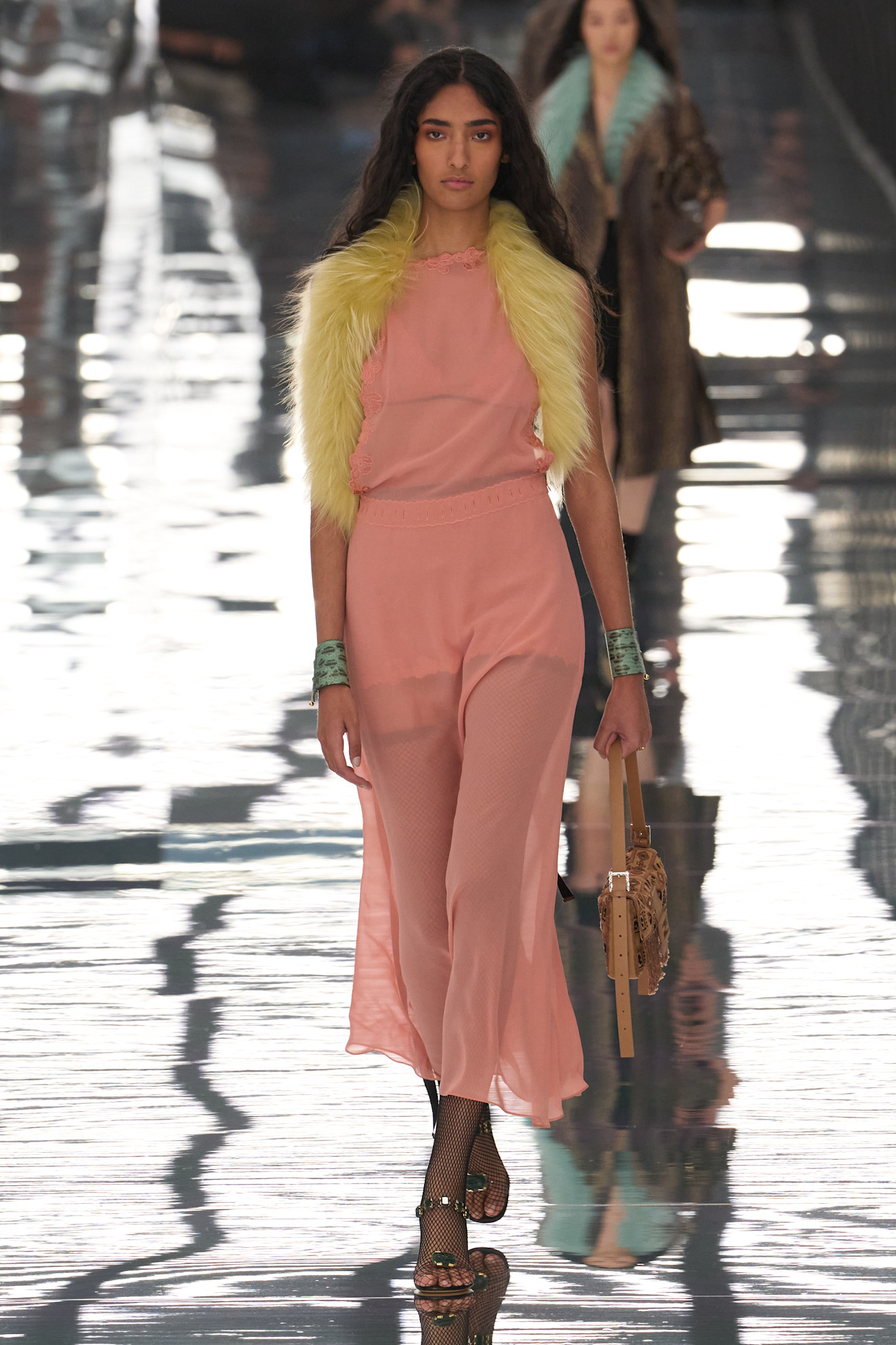 Photos of models walking down the runway at the Fendi Spring Summer 2027 show during Milan Fashion Week
