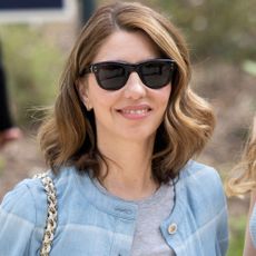 Sofia Coppola wears a blue jacket