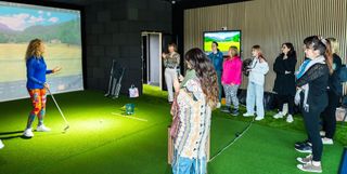 Coaching women who are new to golf in groups