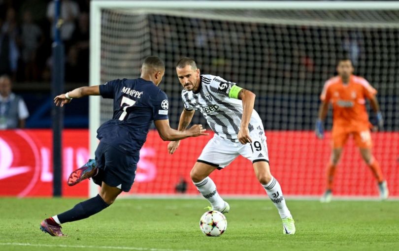 Kylian Mbappe takes on Leonardo Bonucci