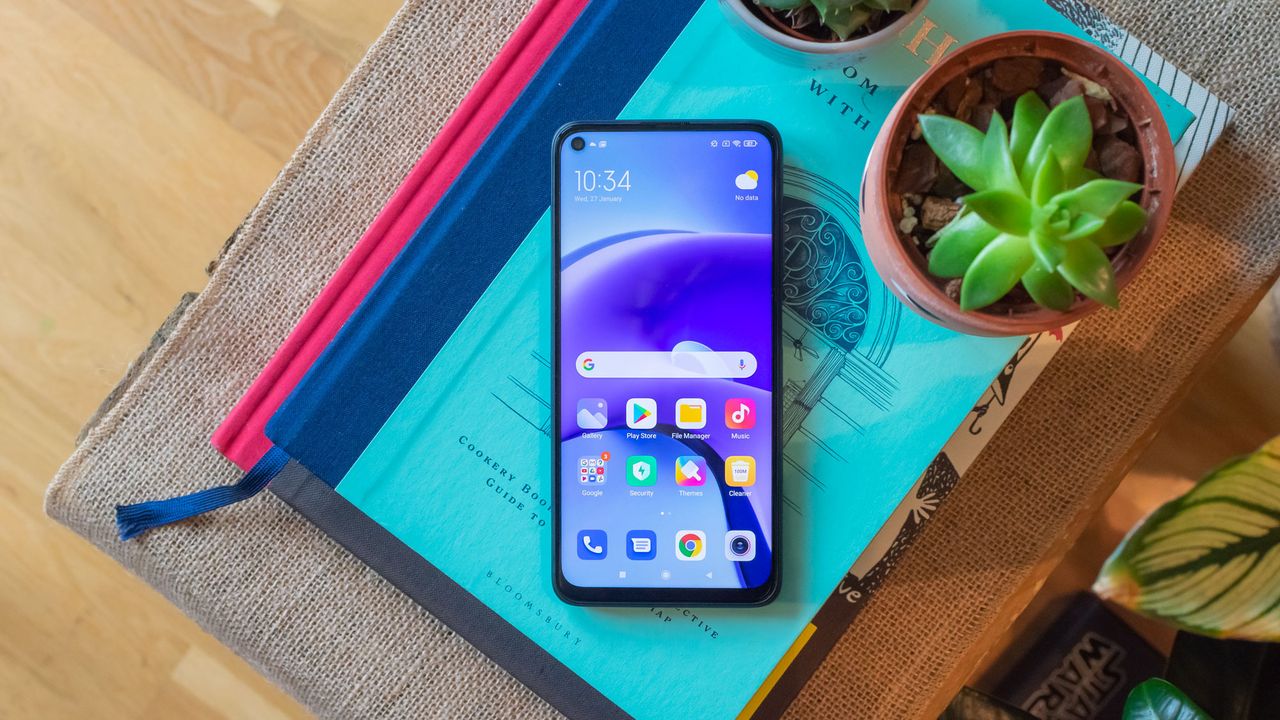 Xiaomi Redmi Note 9T on a pile of books