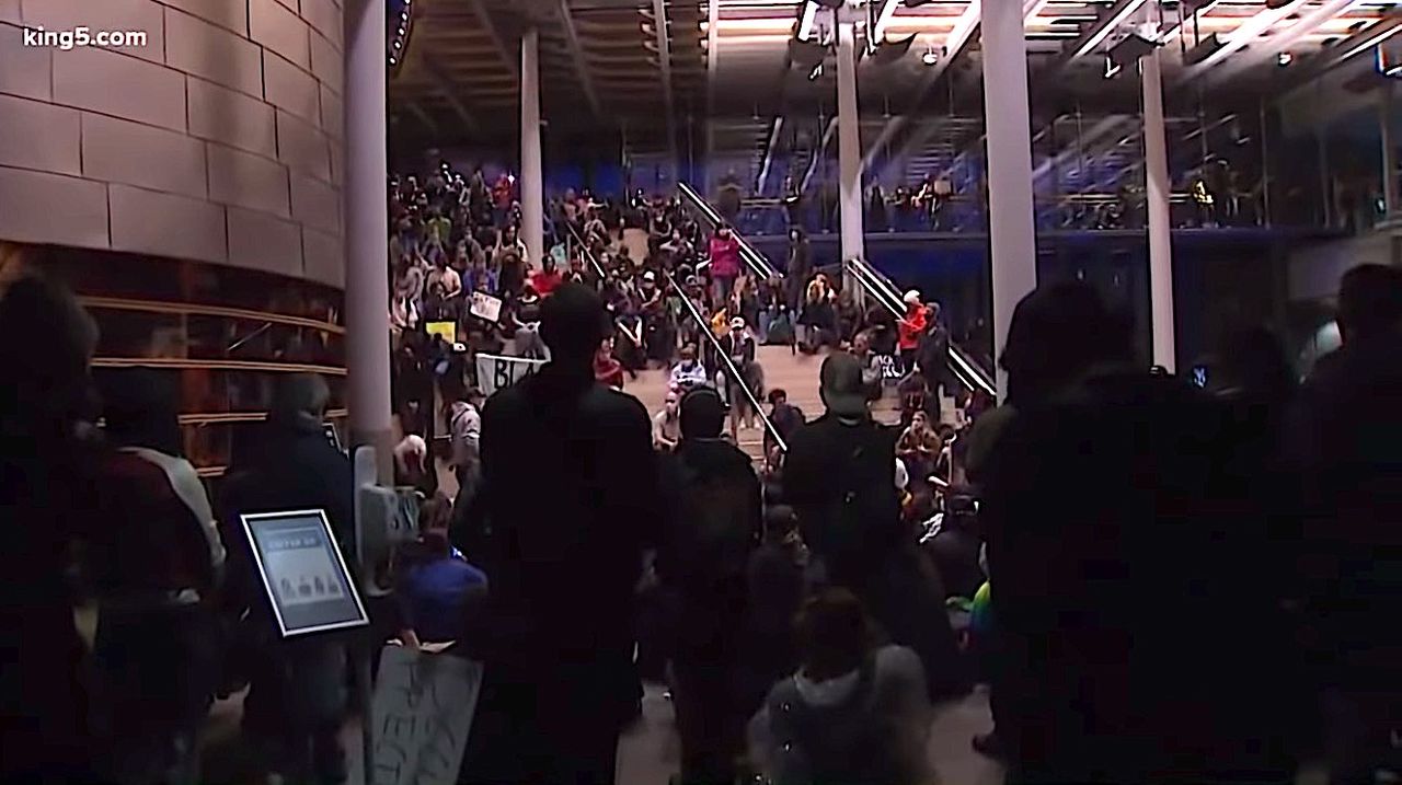 Protesters occupy City Hall