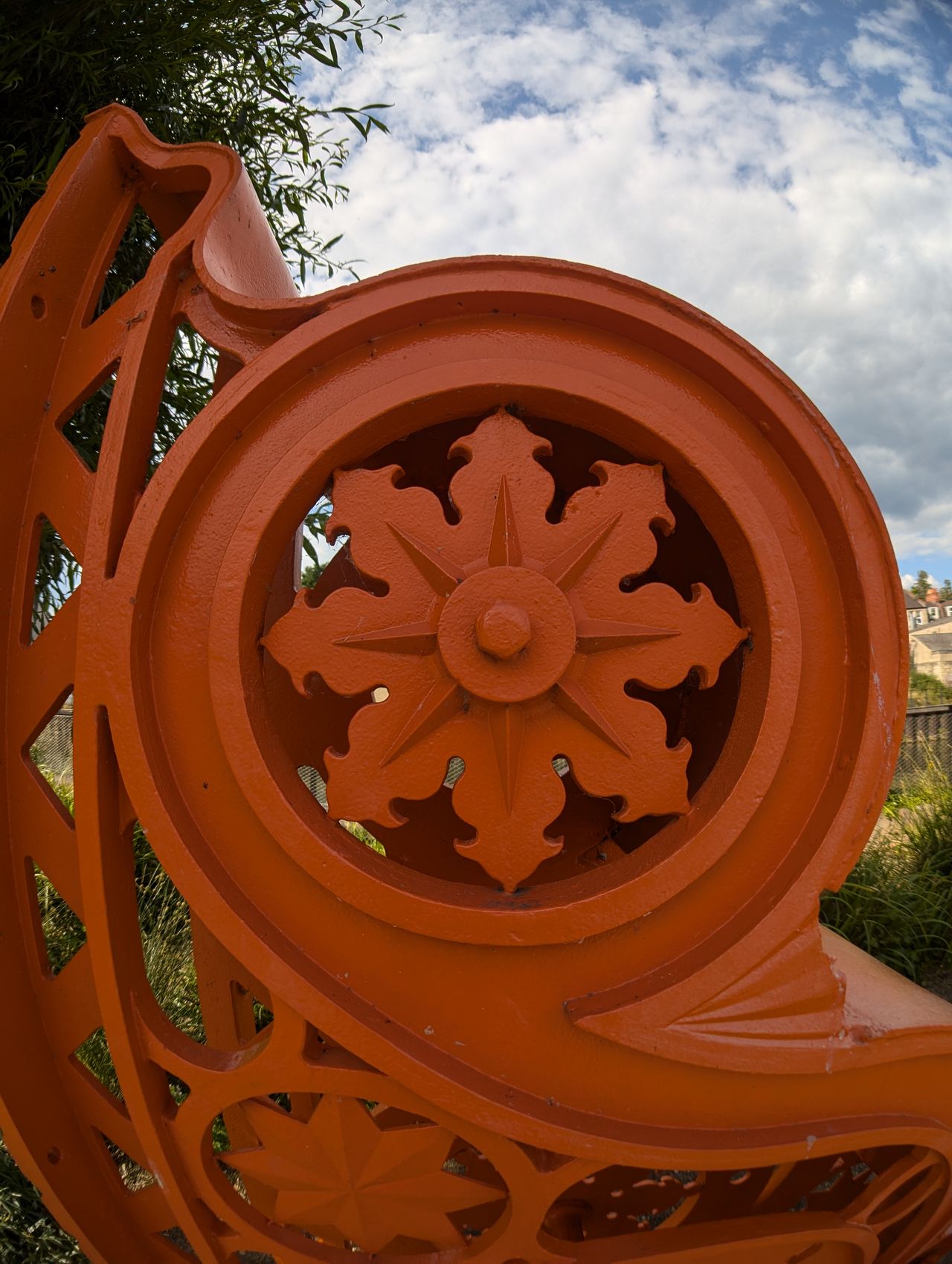 A photo of an orange structure, taken with a Moment Fisheye 14mm lens attached to a Google Pixel 7 Pro