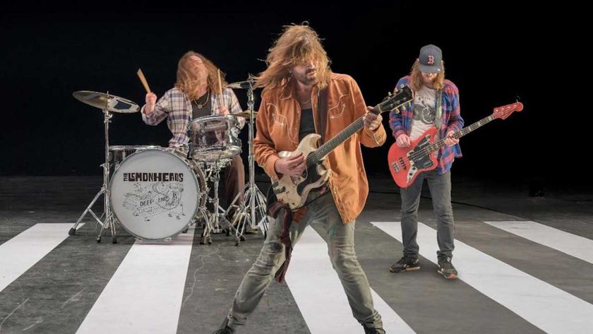 Lemonheads pretending to play on a pretend level crossing