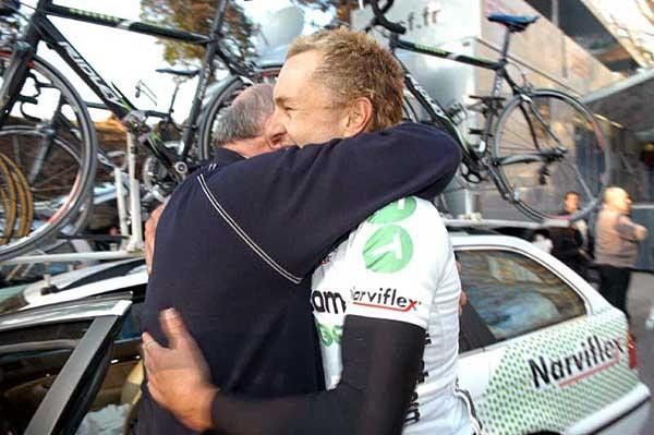 Cooke is congratulated by his boss