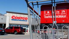 Exterior of Costco store as seen through a Costco shopping cart