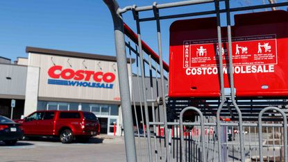 Exterior of Costco store as seen through a Costco shopping cart