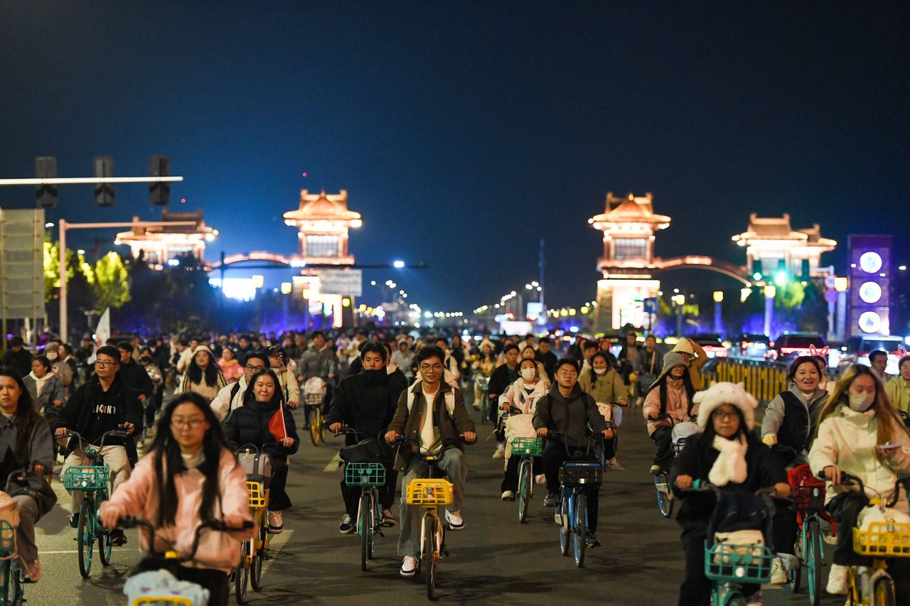 Students on bikes in China