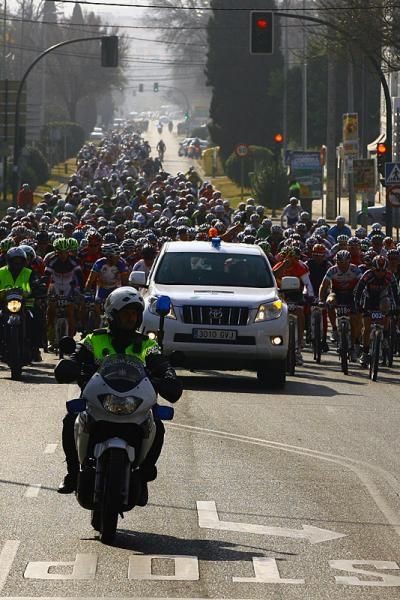 Riders in the neutral section await the start of the prologue.