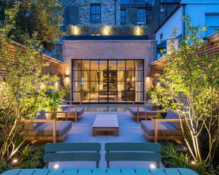 courtyard garden with furniture and lighting