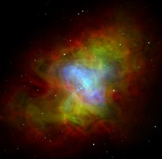This image of the Crab Nebula combines visible light (green) and radio waves (red) emitted by the remnants of a cataclysmic supernova explosion in the year 1054, and the X-ray nebula (blue) created inside the optical nebula by a neutron star (the collapsed core of the massive star destroyed in the explosion).