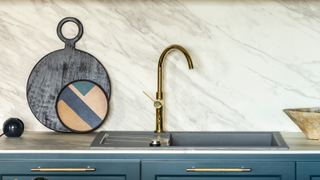 Kitchen with gold sink