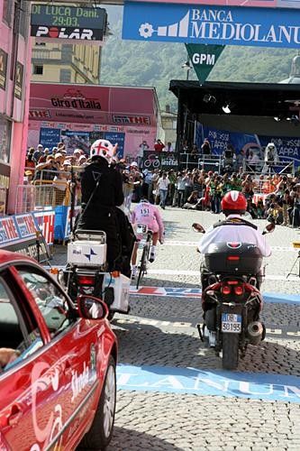 The maglia rosa Danilo Di Luca sprints over the finish line.