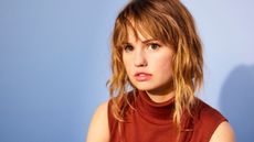 debbie ryan on a blue background