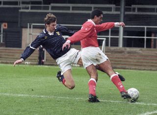 Duncan Ferguson flies into a challenge for Scotland's Under-21 side against Malta in 1993.