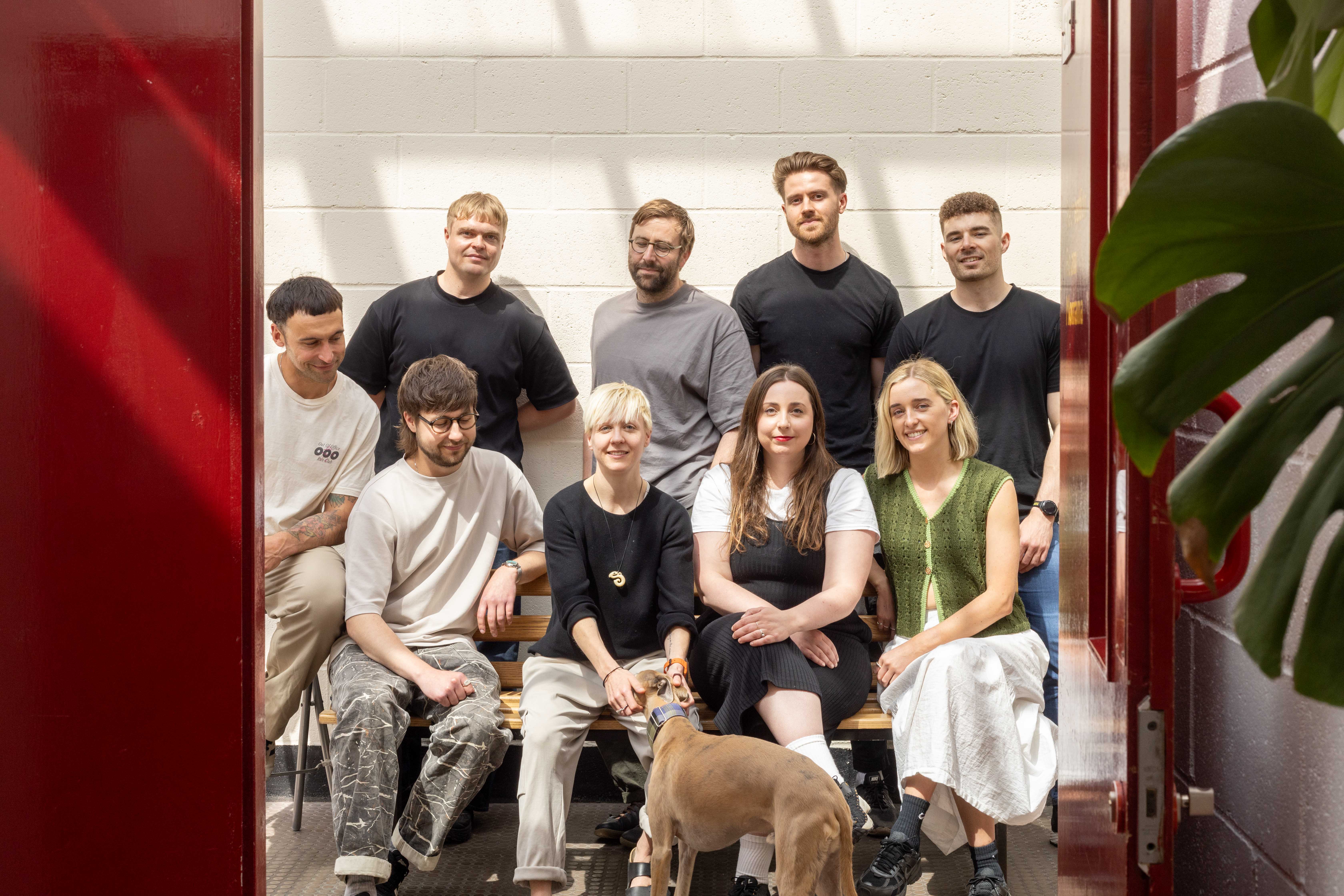 a team of people and a dog