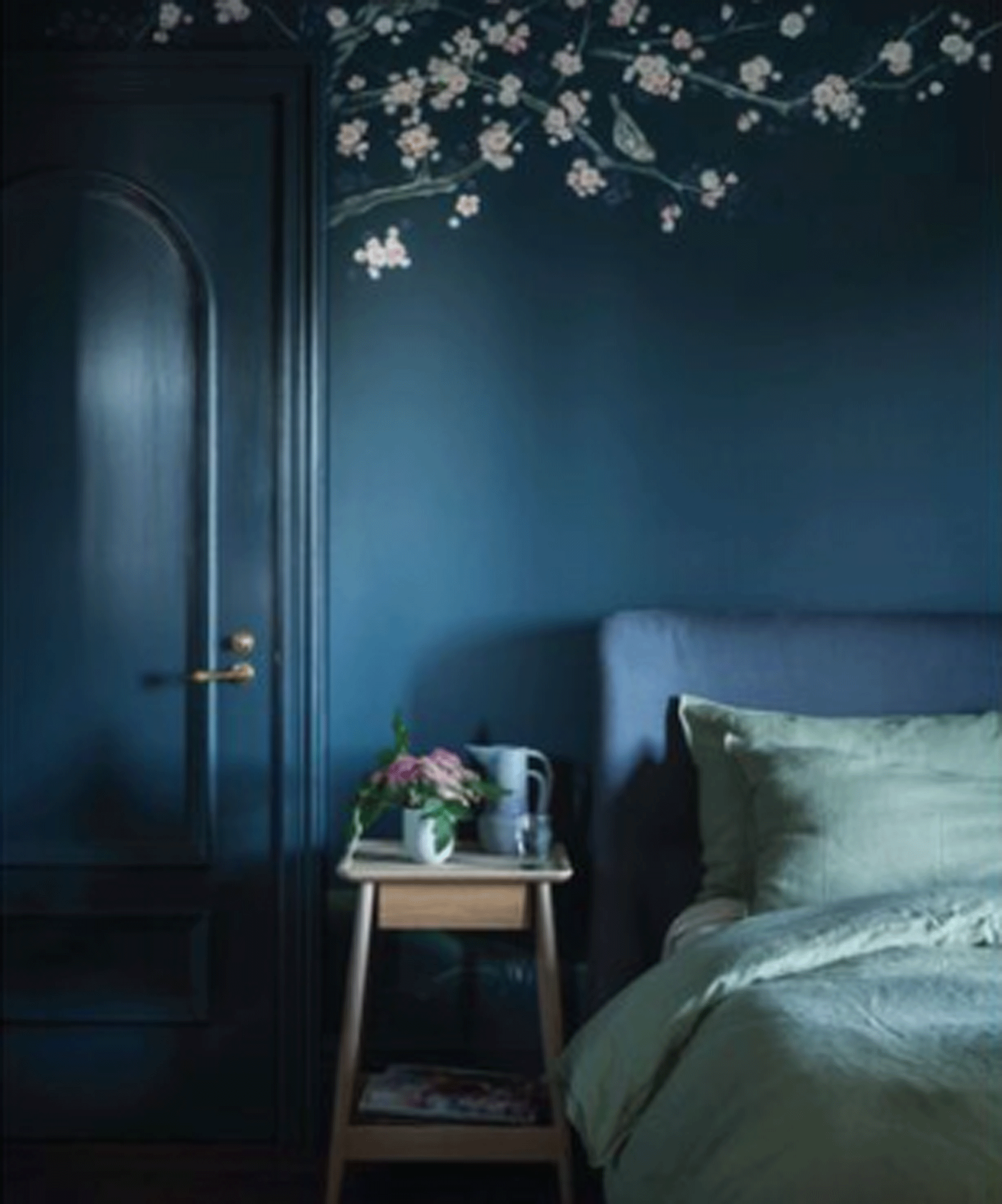 Navy bedroom with doors and ceiling also in navy