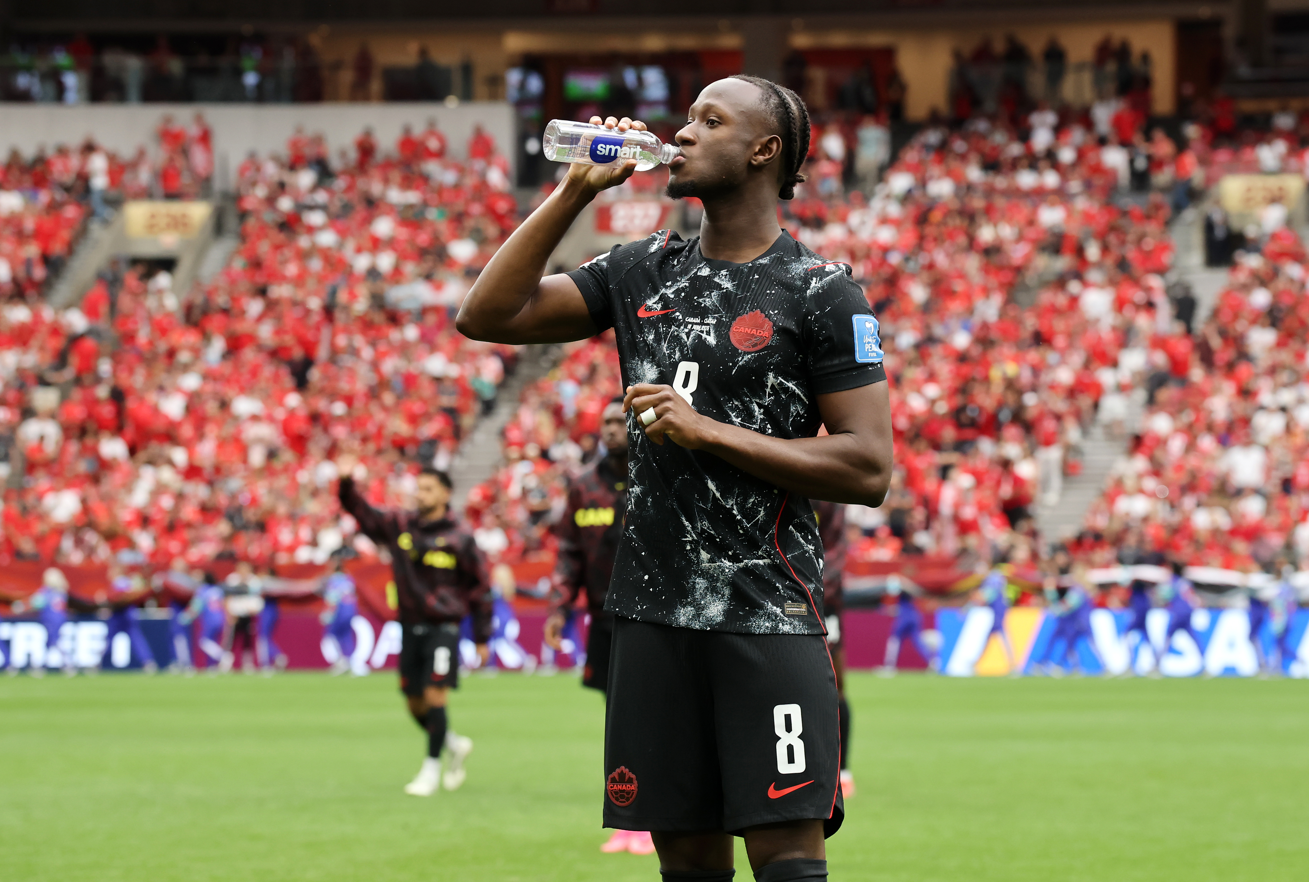 VANCOUVER, BRITISH COLUMBIA - JUNE 18: Ismael Kone #8 of Canada takes a drink before the FIFA World Cup 2026 Group B match between Canada and Qatar at BC Place Vancouver on June 18, 2026 in Vancouver, British Columbia. (Photo by Alex Grimm/Getty Images)