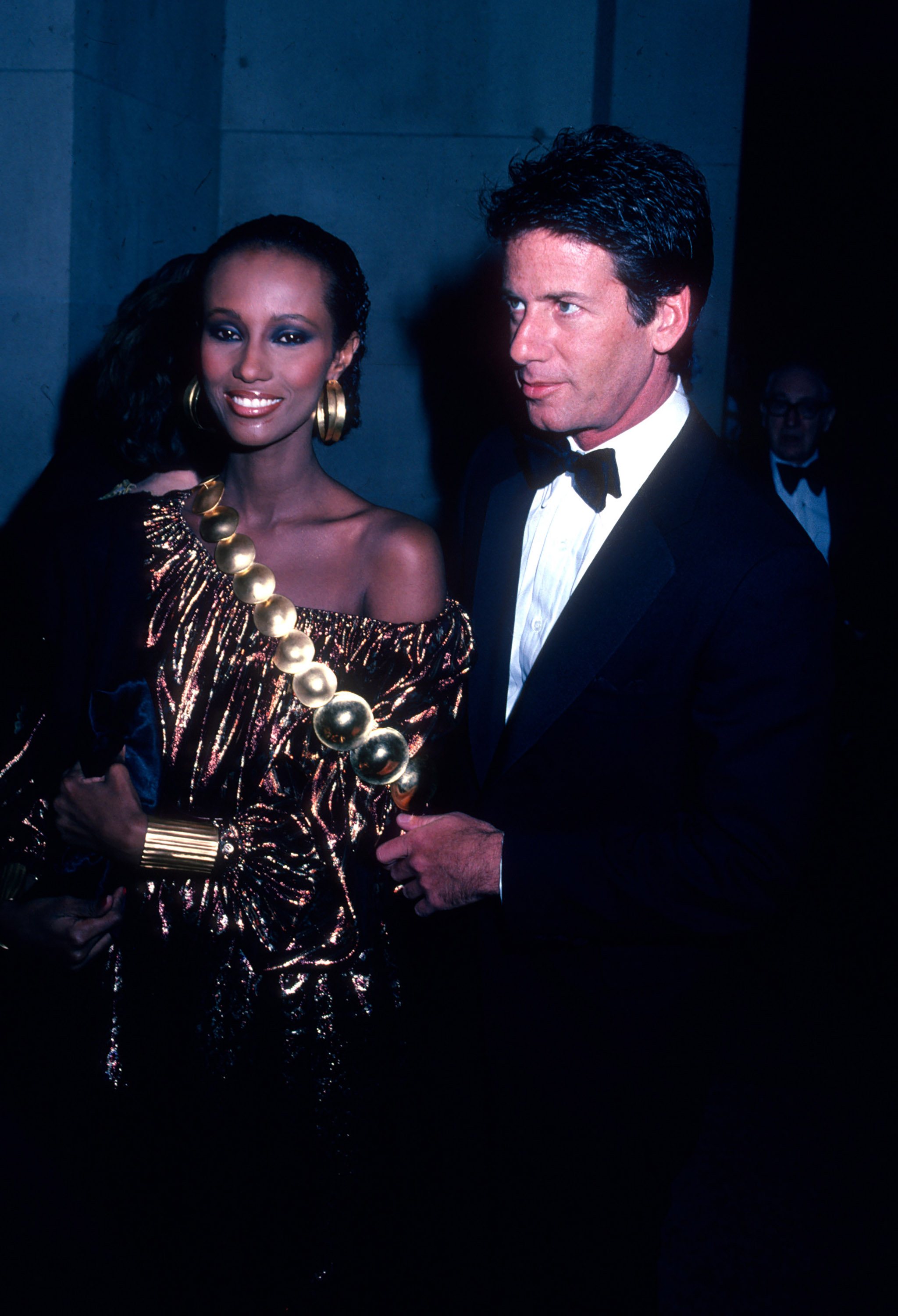 Model Iman and fashion designer Calvin Klein attend the Metropolitan Museum of Art Costume Institute's 'The 18th Century Woman' exhibition in New York, New York on December 7, 1981.
