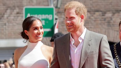 Prince Harry, Duke of Sussex and Meghan, Duchess of Sussex arrive at the town hall during the Invictus Games Dusseldorf 2023 - One Year To Go events, on September 06, 2022 in Dusseldorf, Germany. 