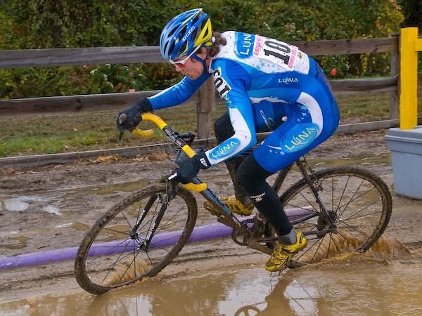 Georgia Gould (Luna Pro Team) navigates a sandy section flooded by a recent storm.
