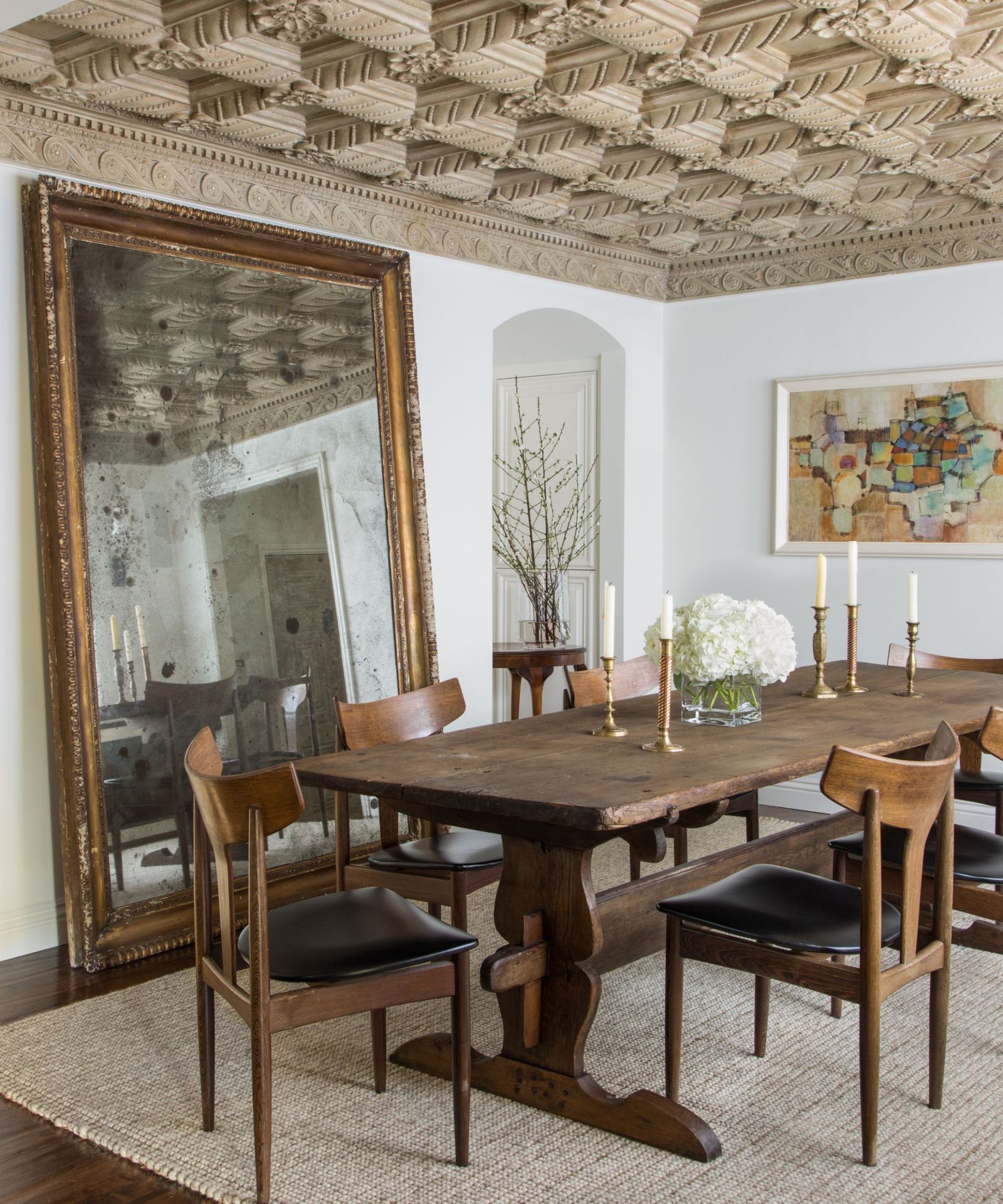 Should you put a rug under a dining table? Designers weigh in Homes