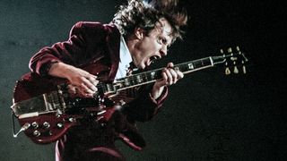 Angus Young of AC/DC performs at The ONMI Coliseum on August 17, 2000 in Atlanta, Georgia.