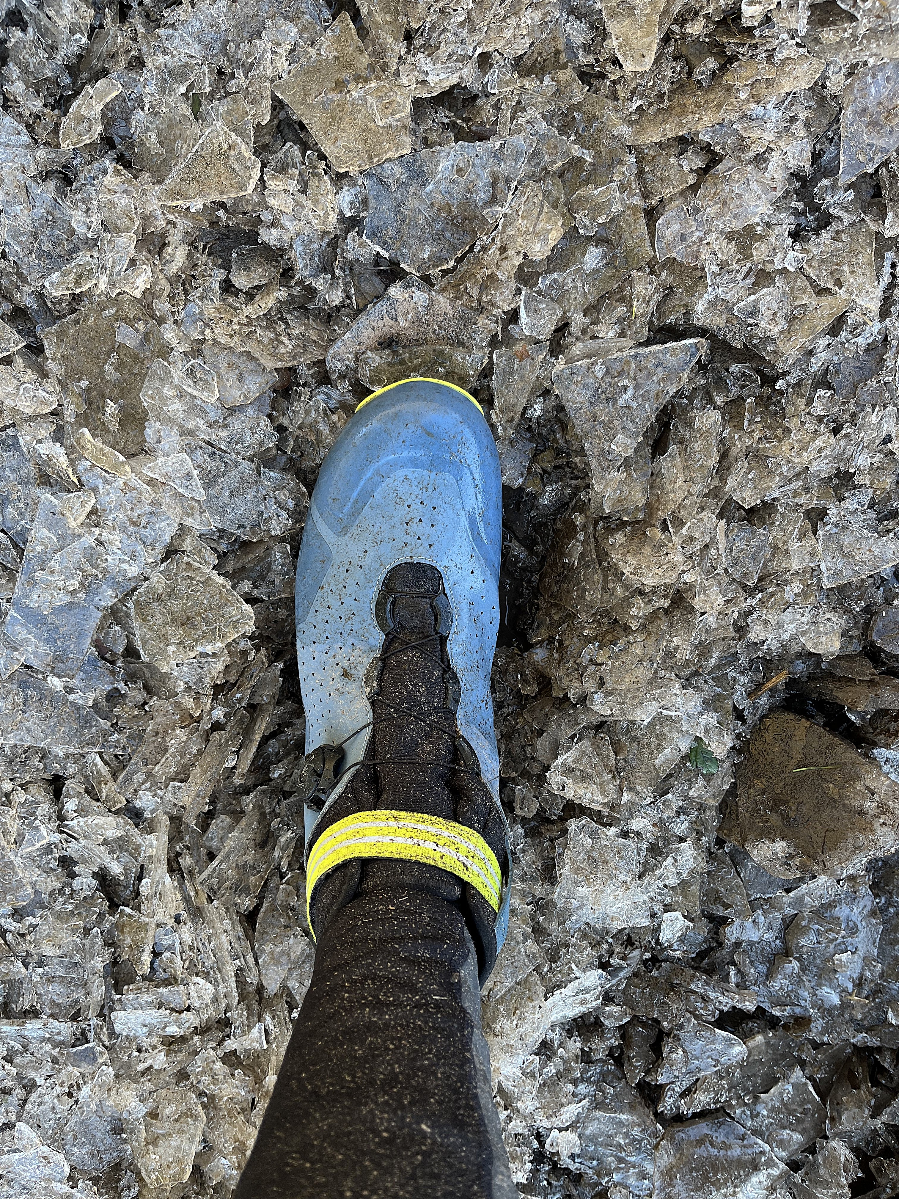 A blue Sidi Nix winter boot on broken ice