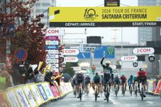 SAITAMA JAPAN NOVEMBER 02 Hailu Biniam Girmay of Eritrea and Team Intermarche Wanty Green Sprint Jersey celebrates at finish line as race winner ahead of LR Jasper Philipsen of Belgium and Team TDF Legends Mark Cavendish of The United Kingdom and Astana Qazaqstan Team and Primoz Roglic of Slovenia and Team Red Bull Bora Hansgrohe Red La Vuelta Leader Jersey during the 10th Tour de France Saitama Criterium 2024 Criterium Race a 612km one day race from Saitama to Saitama on November 02 2024 in Saitama Japan Photo by Rhode Van ElsenGetty Images