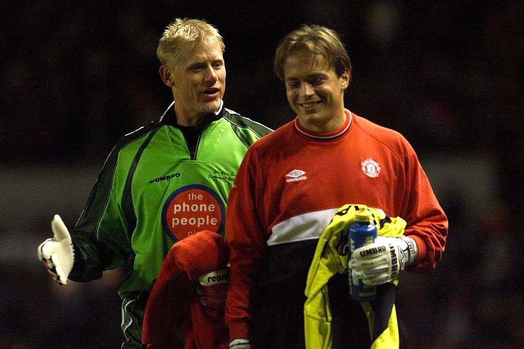 11 Oct 1999; Peter Schmeichel and Mark Bosnich during the Sir Alex Ferguson Testimonial Manchester United v The Rest Of The World XI at Old Trafford, Manchester. Mandatory Credit: Ross Kinnaird/ALLSPORT