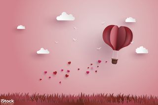 Origami made hot air balloon and cloud by thanaphiphat. This illustration could be used, for example, on the e-newsletter of a romantic-themed travel company