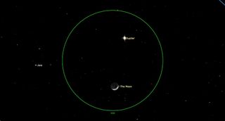 An illustration of the night sky over Earth on Wednesday, Jan. 25 when the moon and Jupiter meet in the night sky.