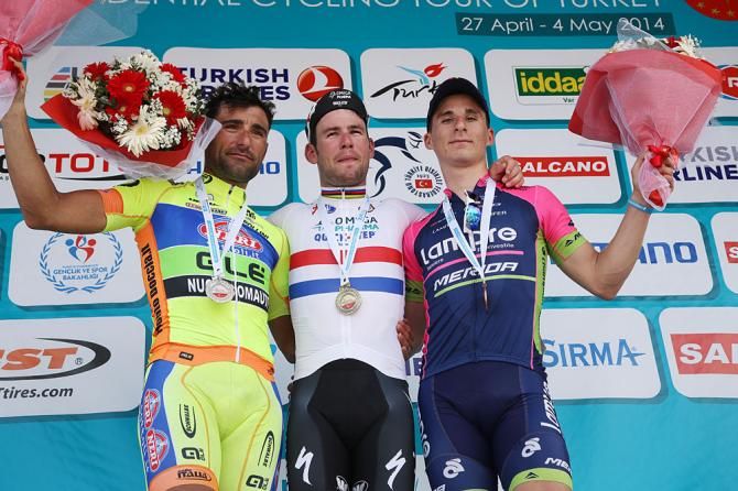 Mark Cavendish atop the podium in stage 2