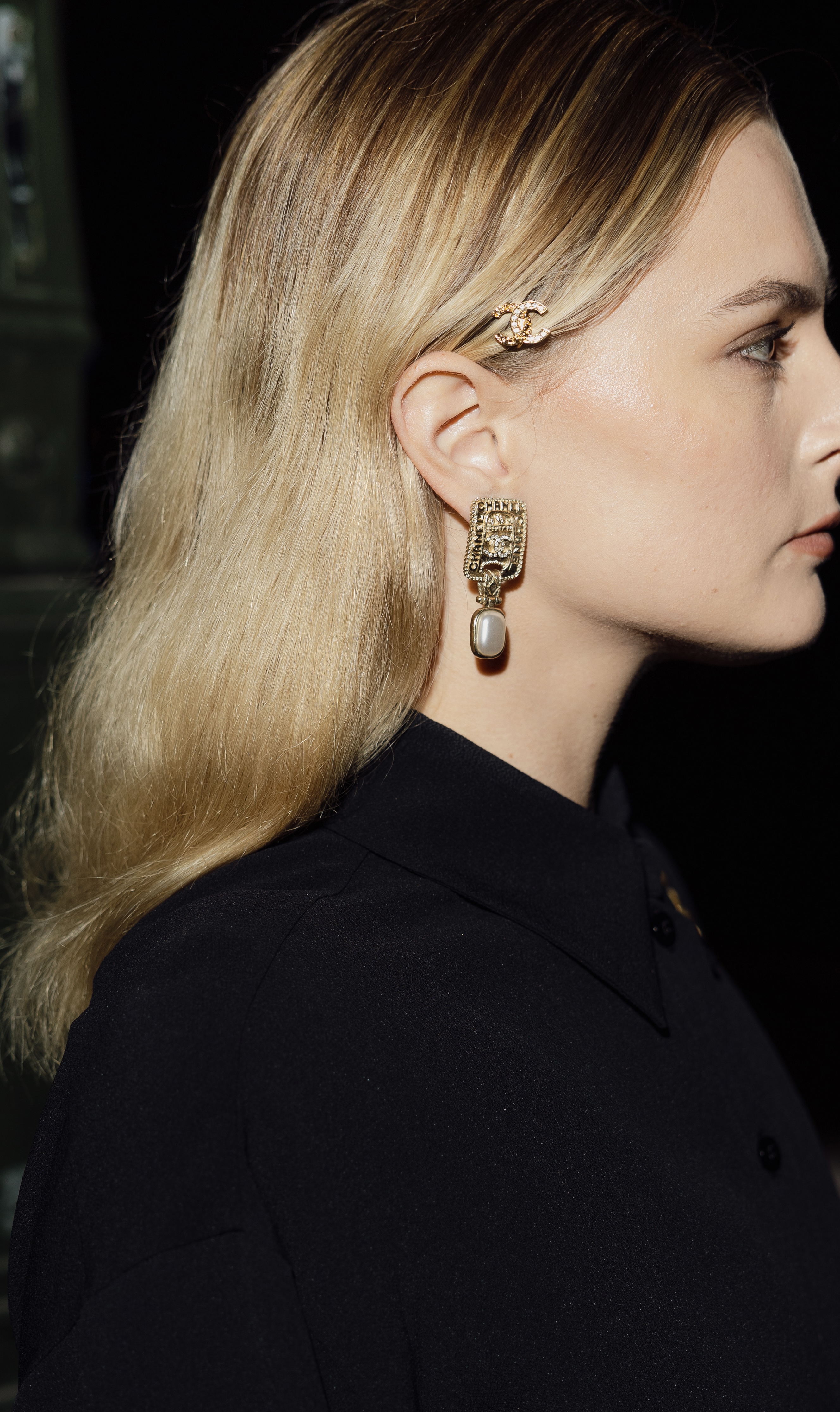 Christie Tyler wearing Chanel earrings