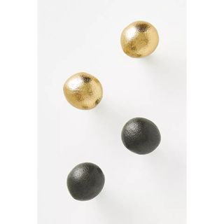 anthropologie black and brass knobs