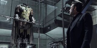 Bruce Wayne looking at Robin suit in Batman v Superman