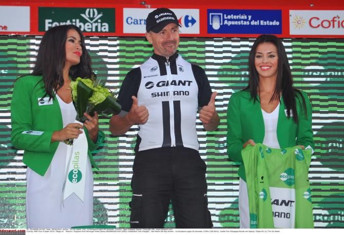 Giant-Shimano soigneur Kine Verzorger stands in for John Degenkolb to collect the green jersey