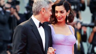 venice, italy september 02 george clooney and amal clooney walk the red carpet ahead of the suburbicon screening during the 74th venice film festival at sala grande on september 2, 2017 in venice, italy photo by vittorio zunino celottogetty images