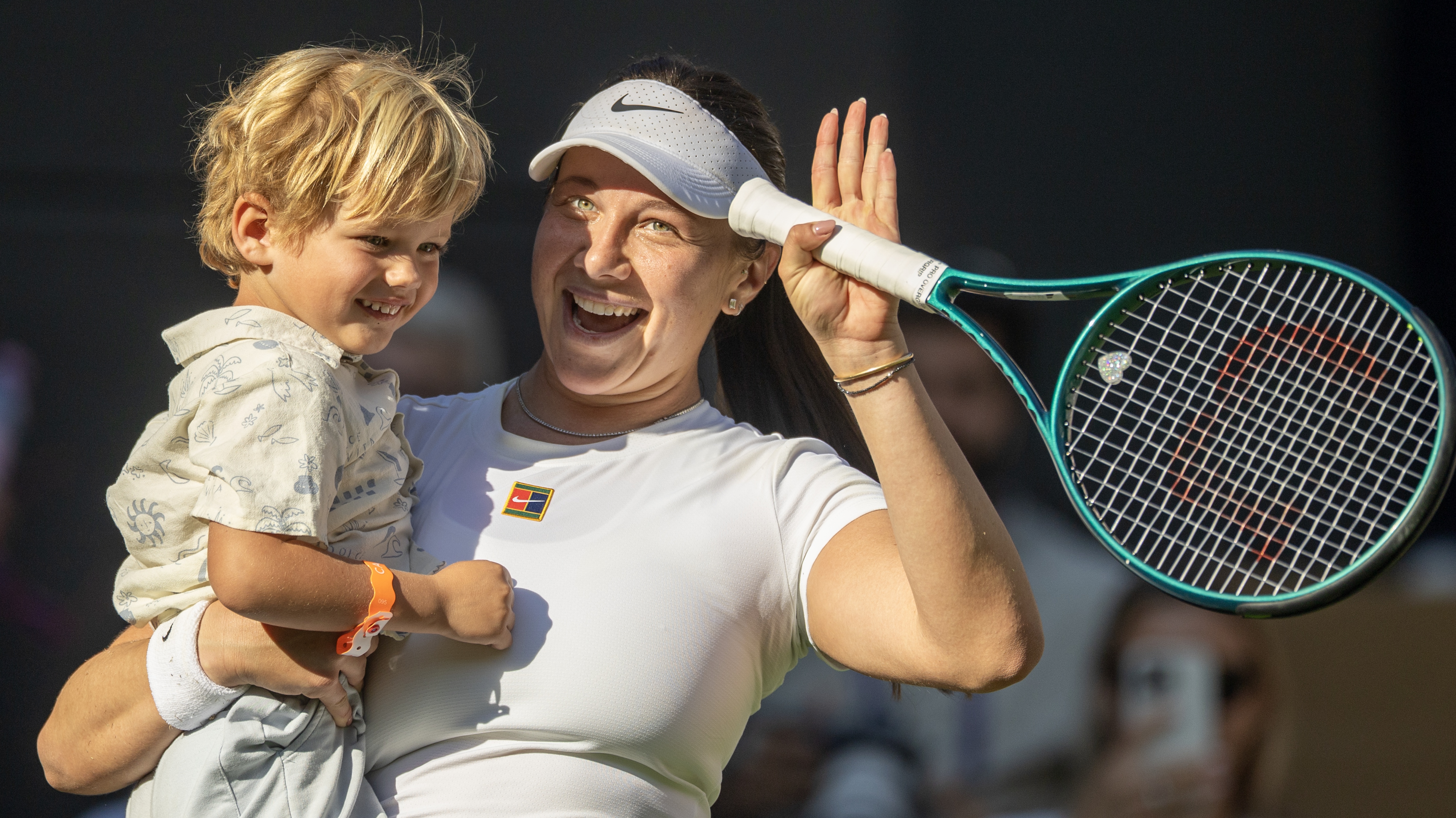 Amanda Anisimova of the United States celebrates her victory with her nephew Jackson after her victory against Anastasia Pavlyuchenkova in the Quarter-Finals of the Ladies&#039; Singles Competition