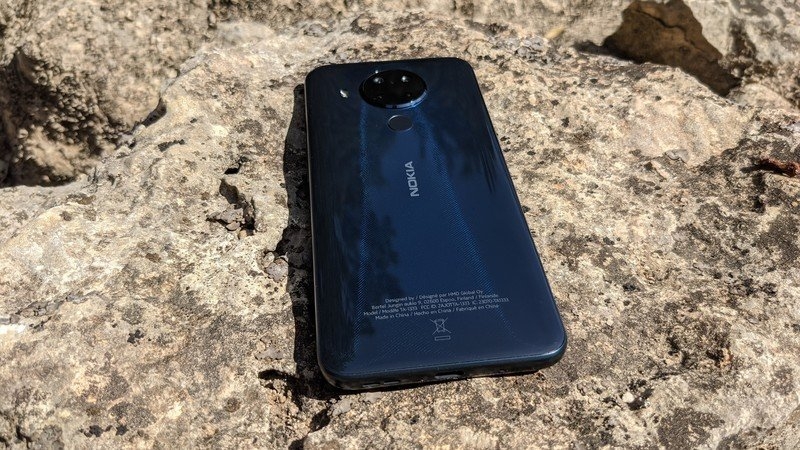 Nokia 5.4 on a rocky ground