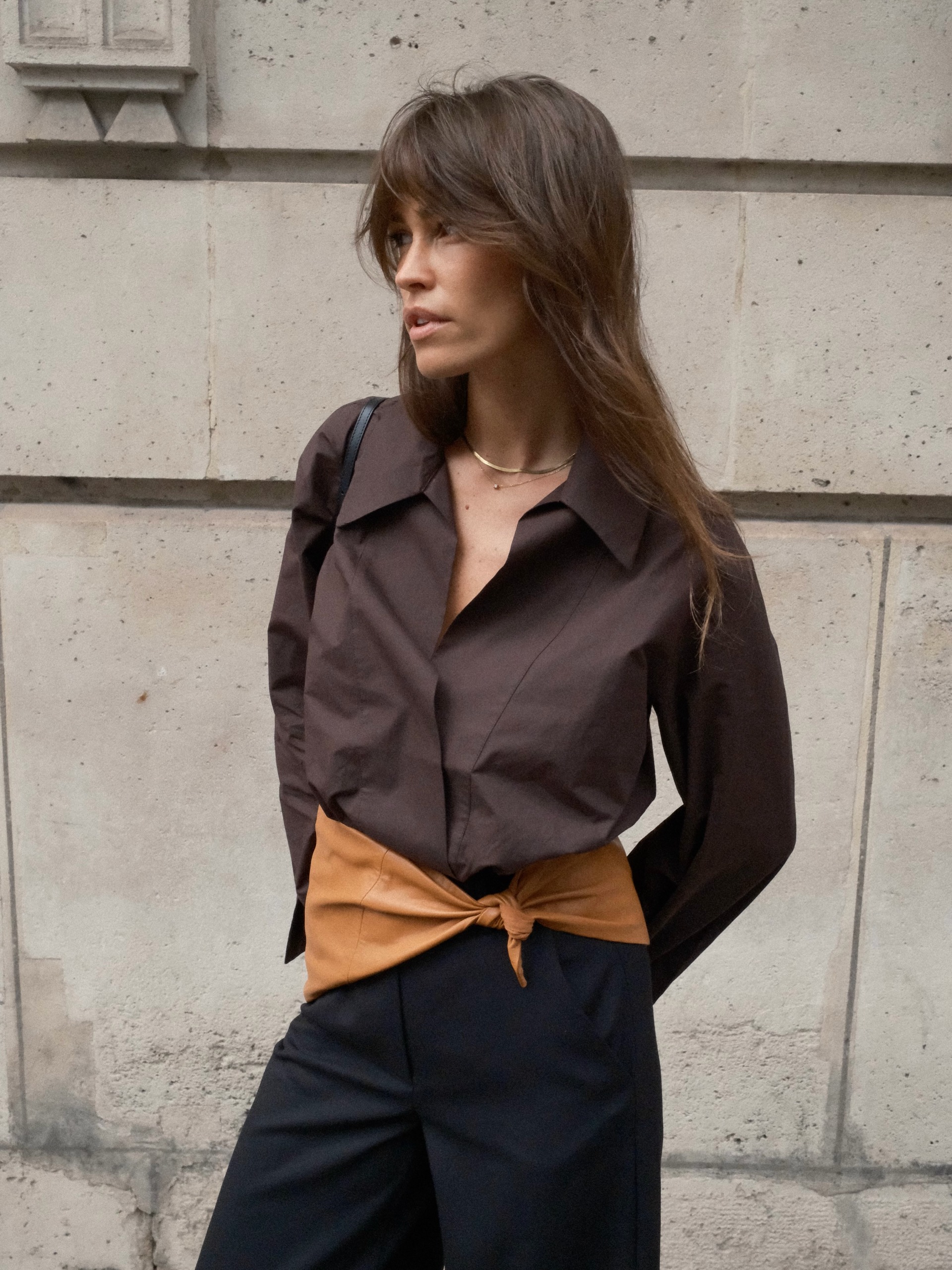 An image of @alisontoby wearing a brown shirt with a tan cummerbund and black trousers.