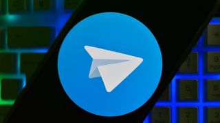 Telegram logo on a mobile screen